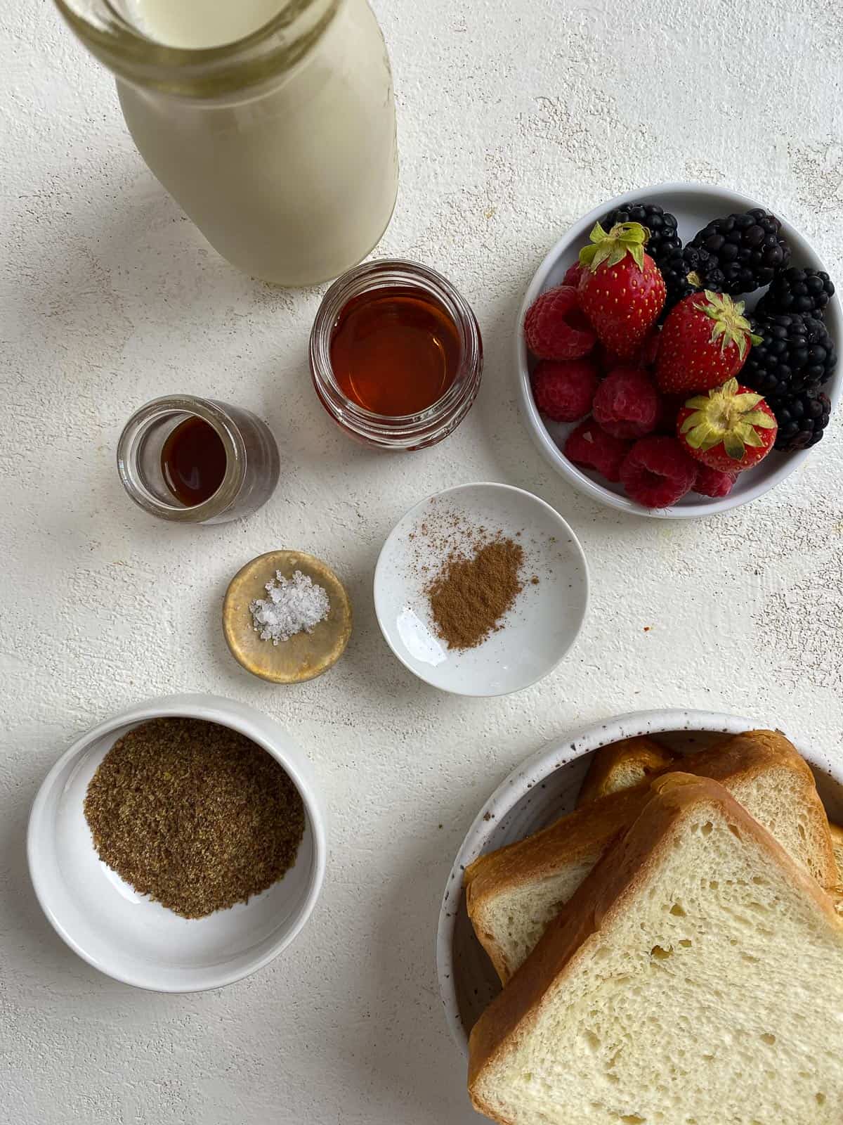 ingredients for Vegan French Toast measured out against a white background