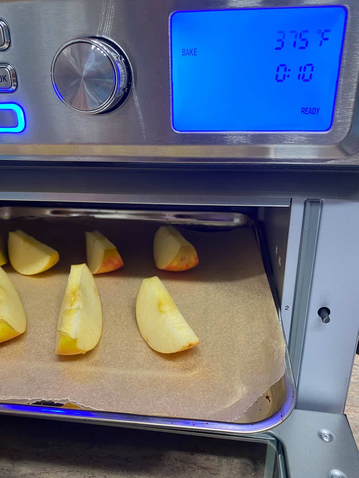Apple Crescent Rolls being placed into an oven