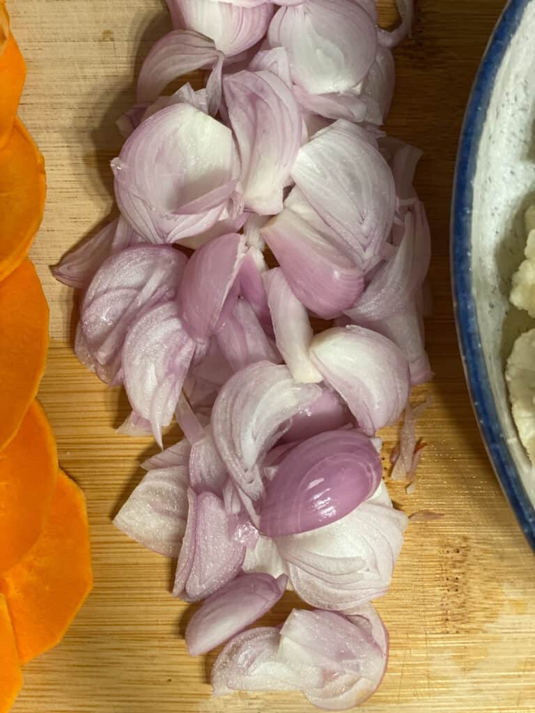 close up of onions on cutting board