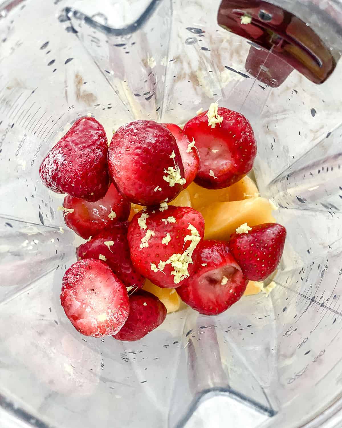 ingredients for ginger fruit smoothie in a blender
