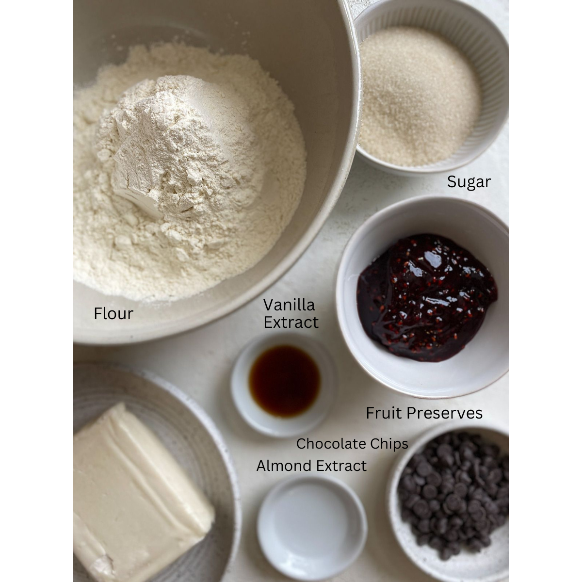 ingredients for Raspberry Thumbprint Cookies measured out against a white surface