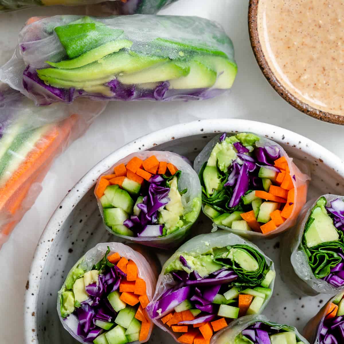 https://plantbasedonabudget.com/wp-content/uploads/2015/01/Fresh-Rainbow-Rolls-with-Almond-Shallot-Sauce-Plant-Based-on-a-Budget-1-2.jpg