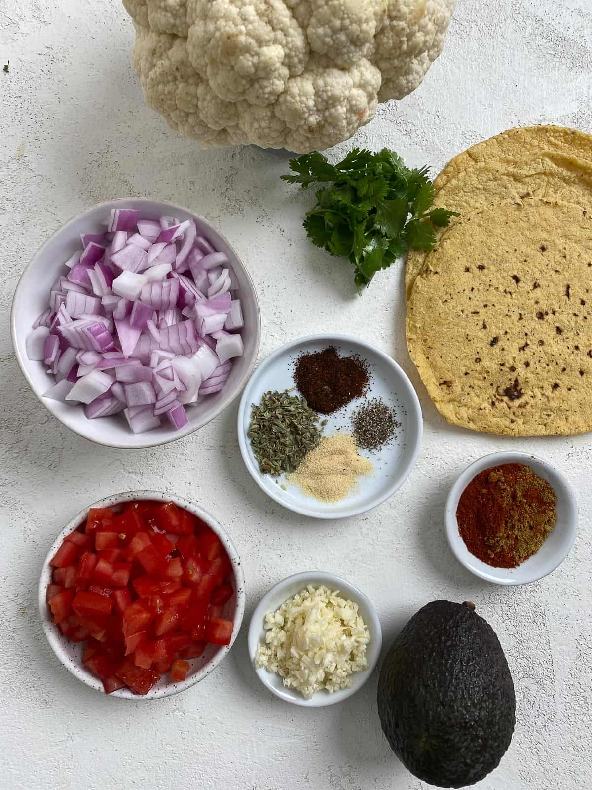 ingredients for Cauliflower and Lentil Tacos measured out against a light surface