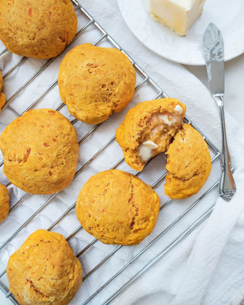 completed sweet potato biscuits on a cooling rack against a white surface