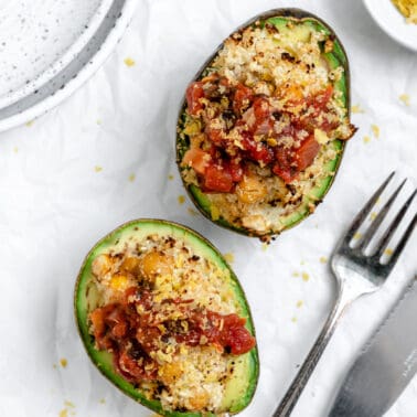 completed Healthy Stuffed Avocados against a white surface