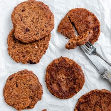 completed Easy Vegan Burgers spread out on a white surface