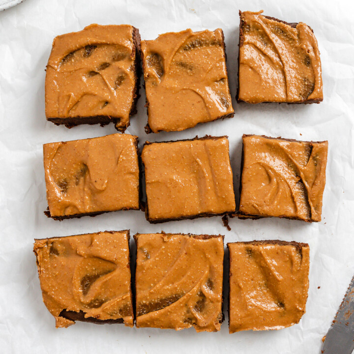 completed Sweet Potato Brownies cut into 9 squares on a white surface