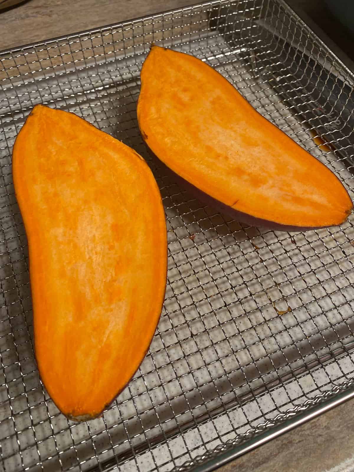 sliced sweet potato on baing tray