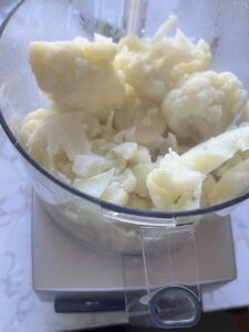 process showing cauliflower in container