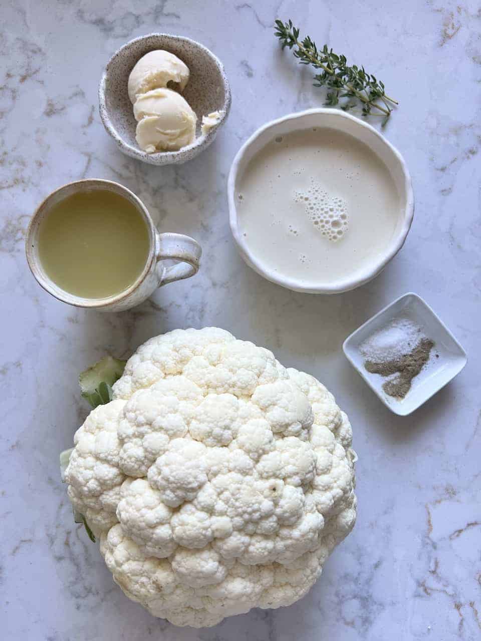 mashed cauliflower ingredients against white background
