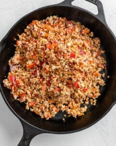 process shot of tofu taco filling in black skillet