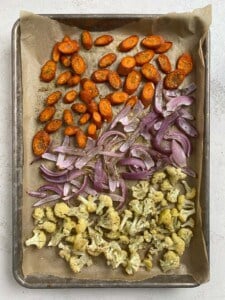 post roasted sliced veggies on a baking tray