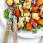 completed Easy Mushy Peas with Roasted Veggies plated on a white bowl against a light background