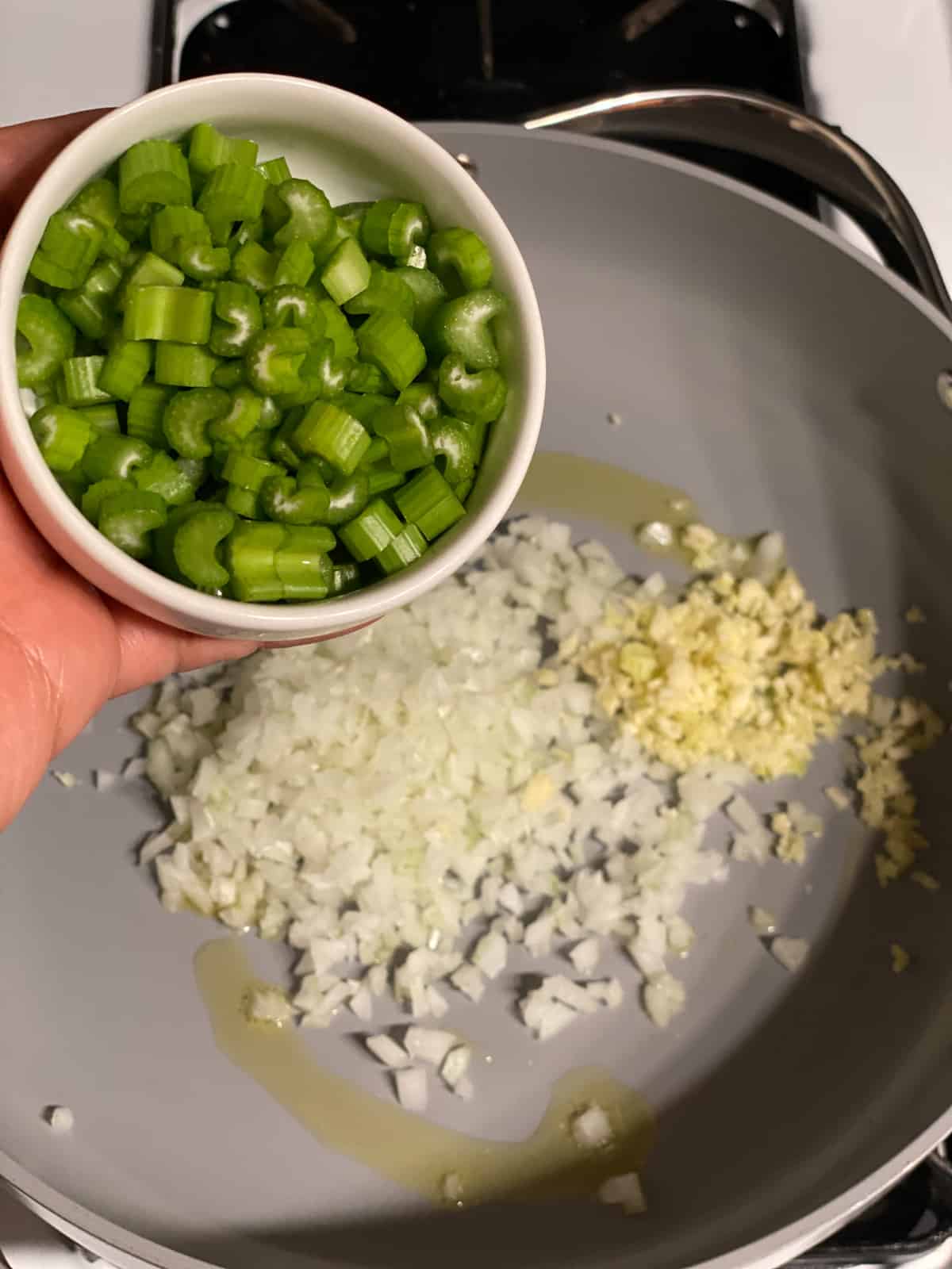process of adding celery to pan