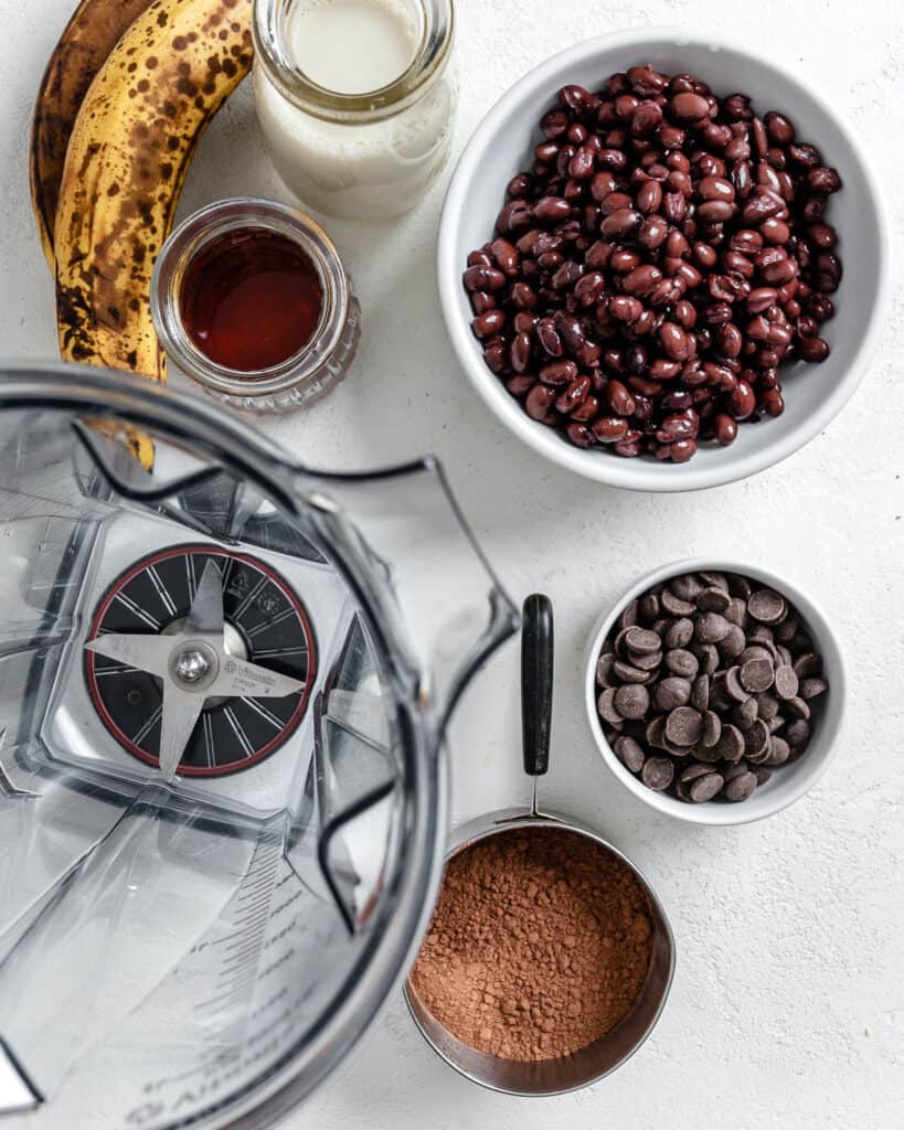 ingredients for chocolate waffles measured out against white background