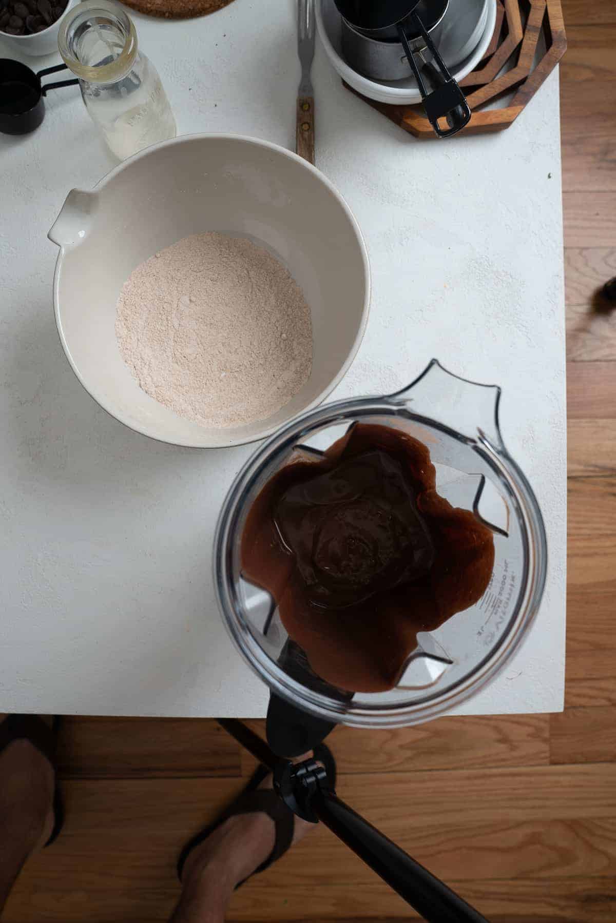ingredients for chocolate waffles against a white surface