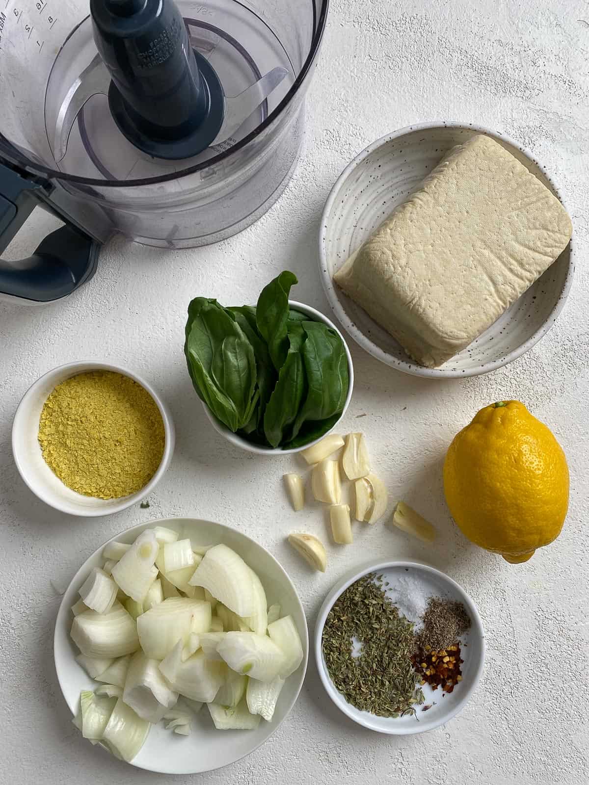 ingredients for Stuffed Shells against a white surface