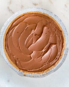 post refrigerated chocolate pie against white surface