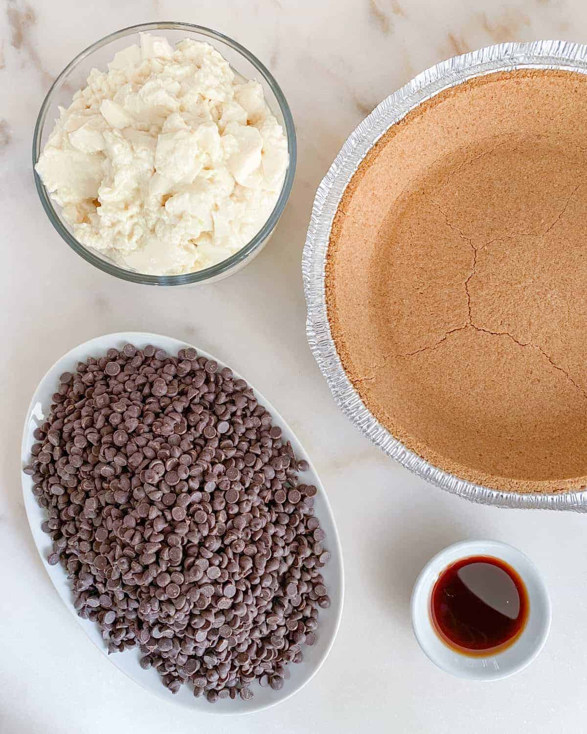 ingredients for chocolate pie against white surface