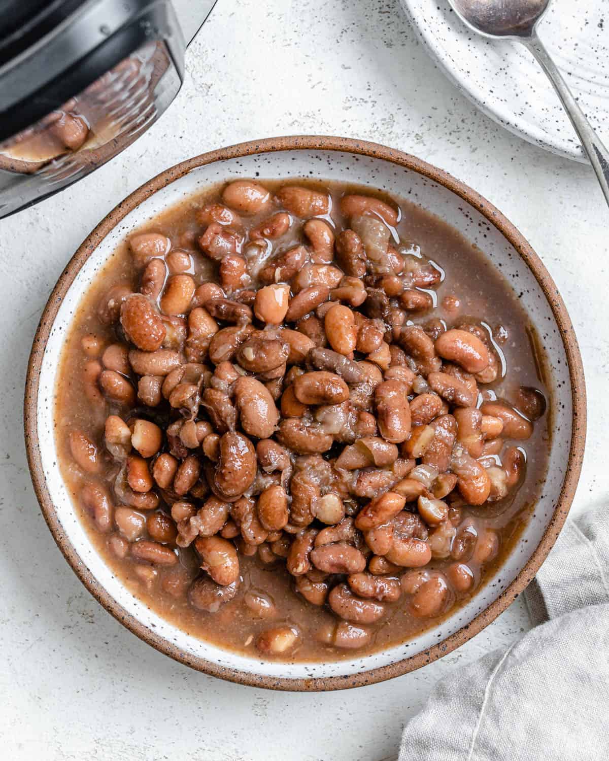 Place the finished Instant Pot pinto beans in a bowl