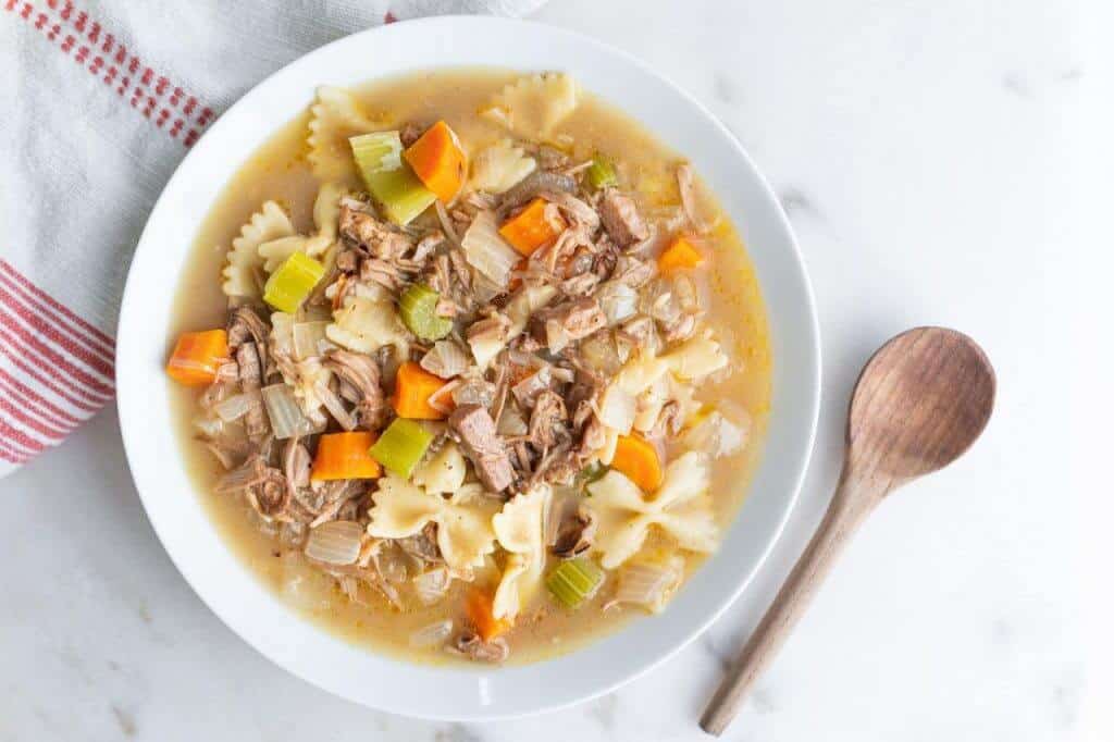 finished Jackfruit Chicken Soup in a white bowl against a white background