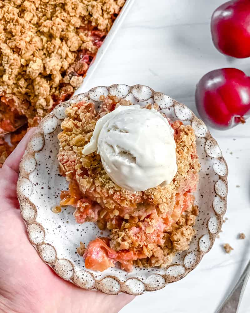 Completed Vegan Plum Crisp piece on a plate.