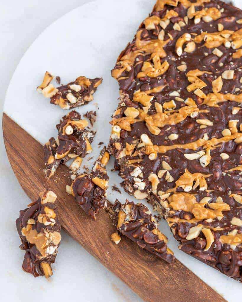 Vegan Chocolate Peanut Butter Bark on a sheet of parchment paper.