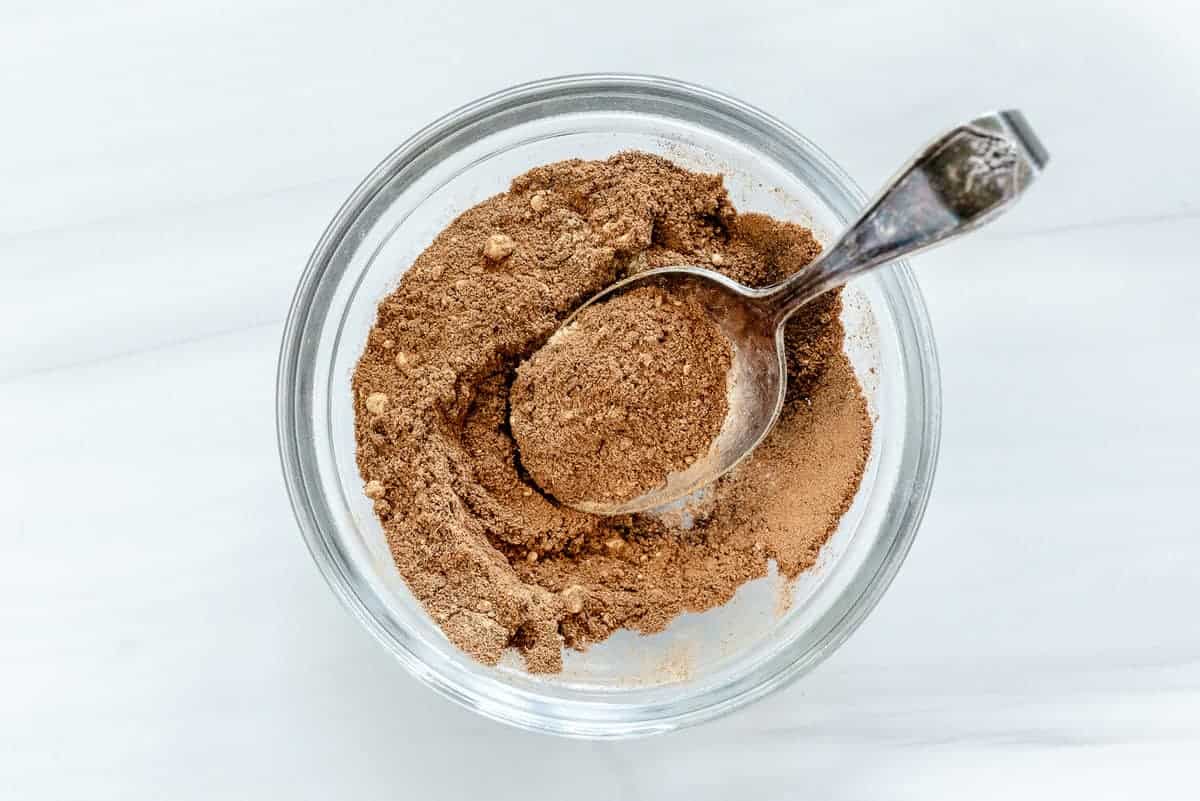 pumpkin spice in glass bowl with a white background