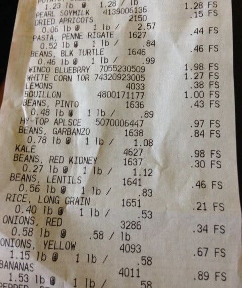 Grocery receipt showing healthy vegan ingredients bought on budget.