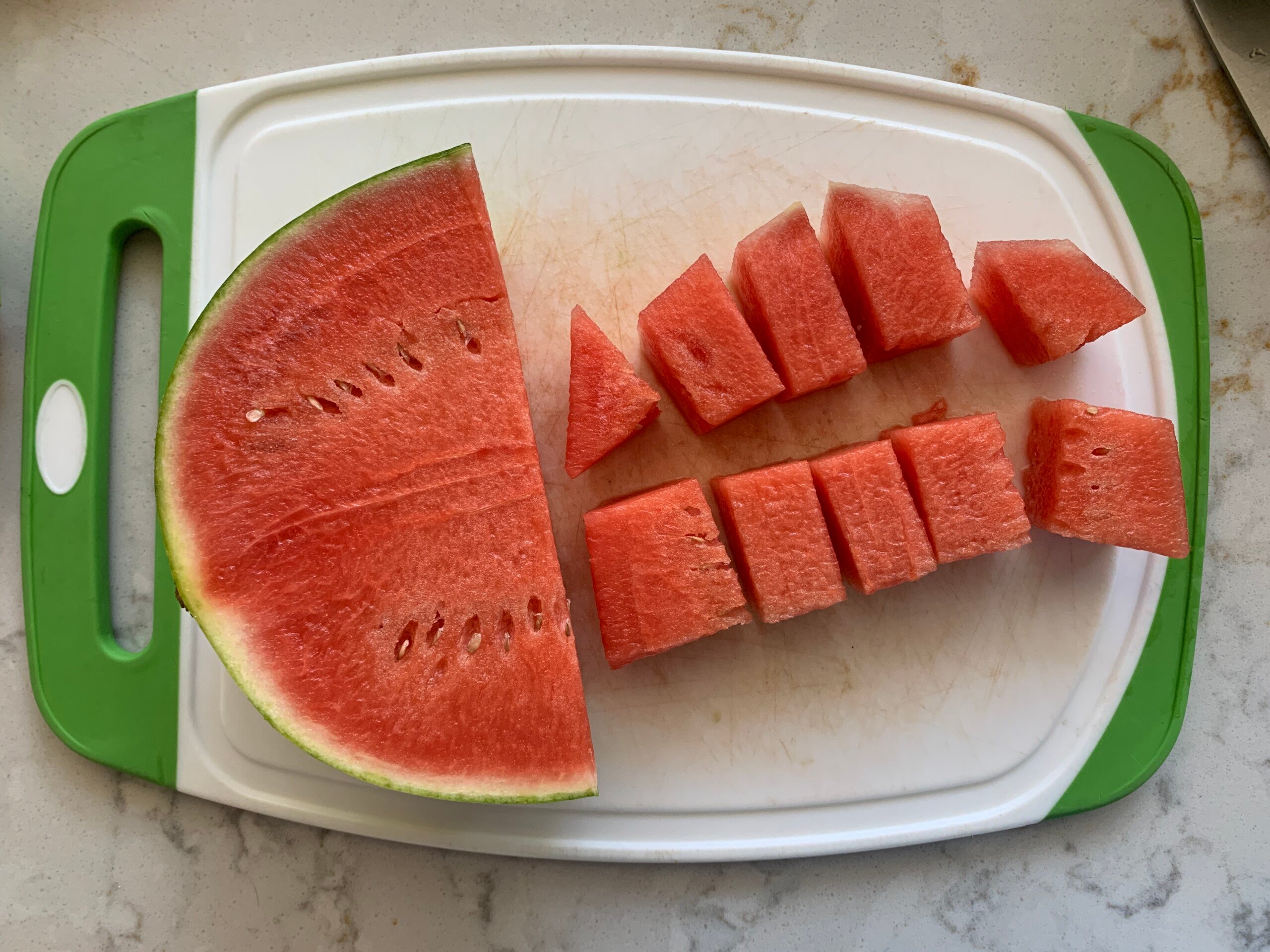 sliced watermelon on cutting board