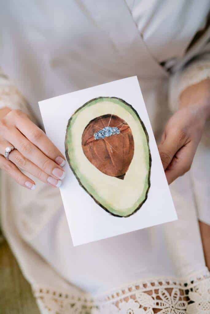 A greeting card with a halved avocado on the front.