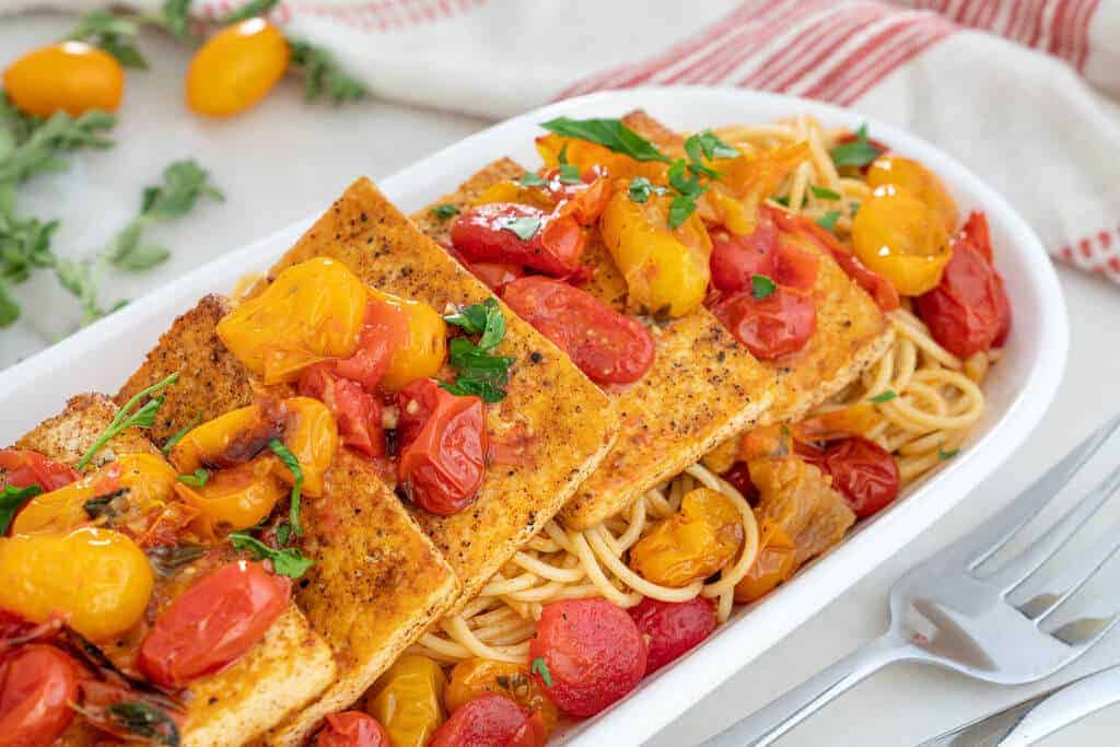 Italian Inspired Tofu Fillets Served on a Long Platter with Spaghetti