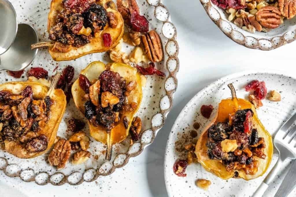 Vegan Baked Pears plated against white background