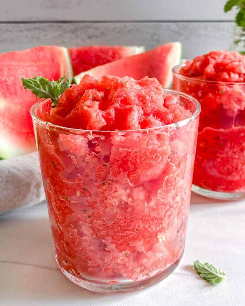 Watermelon slushie in two glasses.