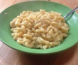 Bowl filled with vegan sweet potato macaroni and "cheese."