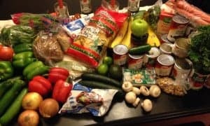 Week's worth of groceries on the kitchen table.