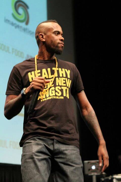 Stic wearing a "Healthy is the New Gangsta: t-shirt.