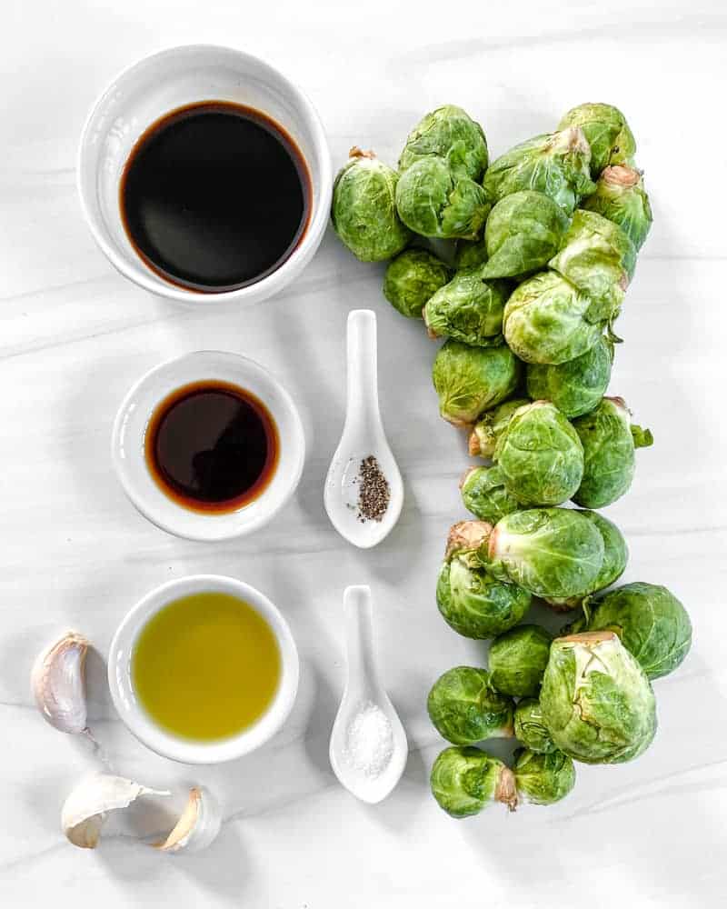 Air Fryer Brussels Sprouts Ingredients measured out against a white background
