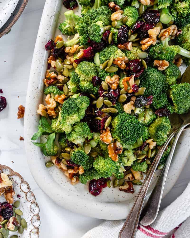 Vegan Broccoli Salad in a white dish against a white background