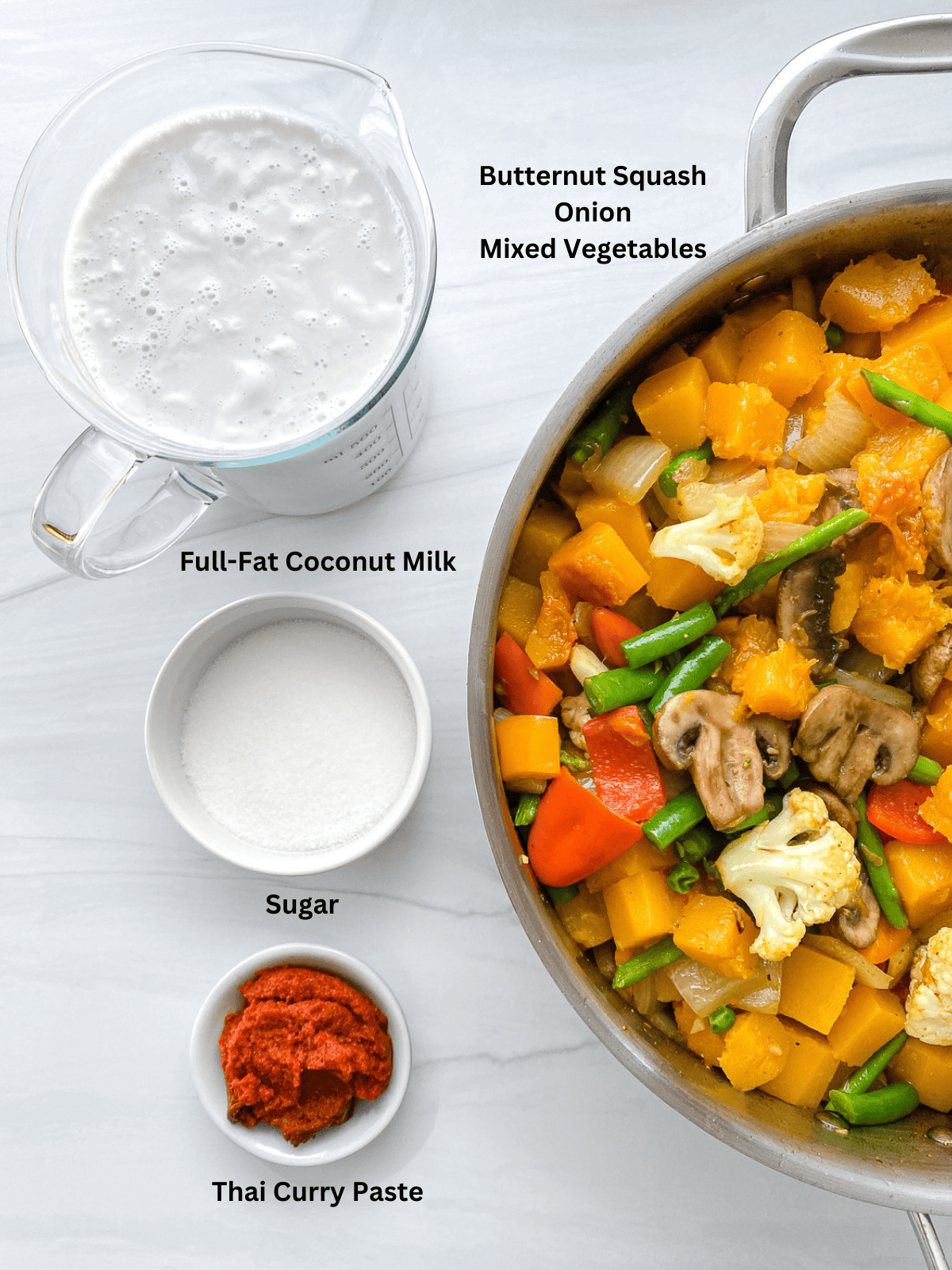 ingredients for Butternut Squash Curry measured out on a white surface