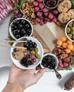 completed Christmas Wreath Charcuterie Board with serving of the board on a small white plate