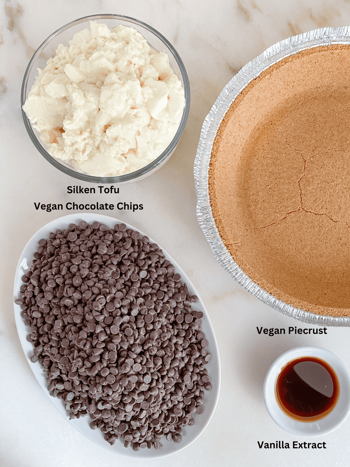 ingredients for Chocolate Pie measured out on a white surface