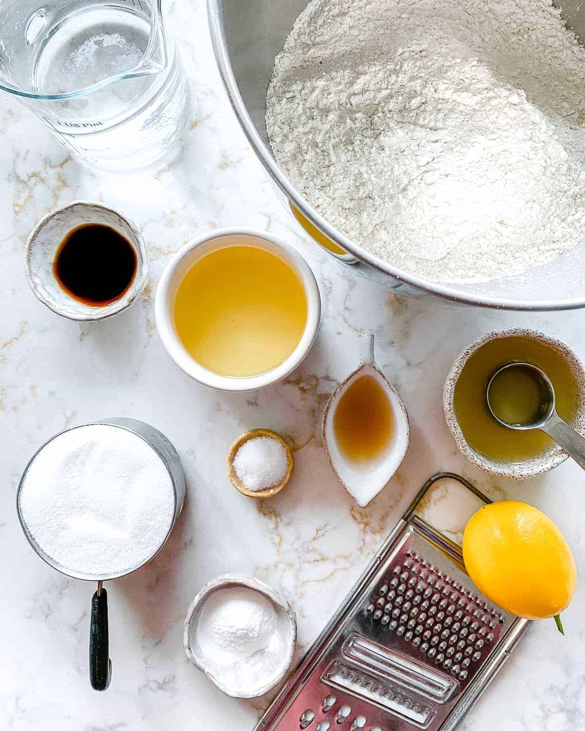 ingredients for Lemon Loaf measured out against a white background