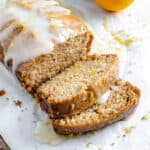 completed sliced lemon loaf against a white background