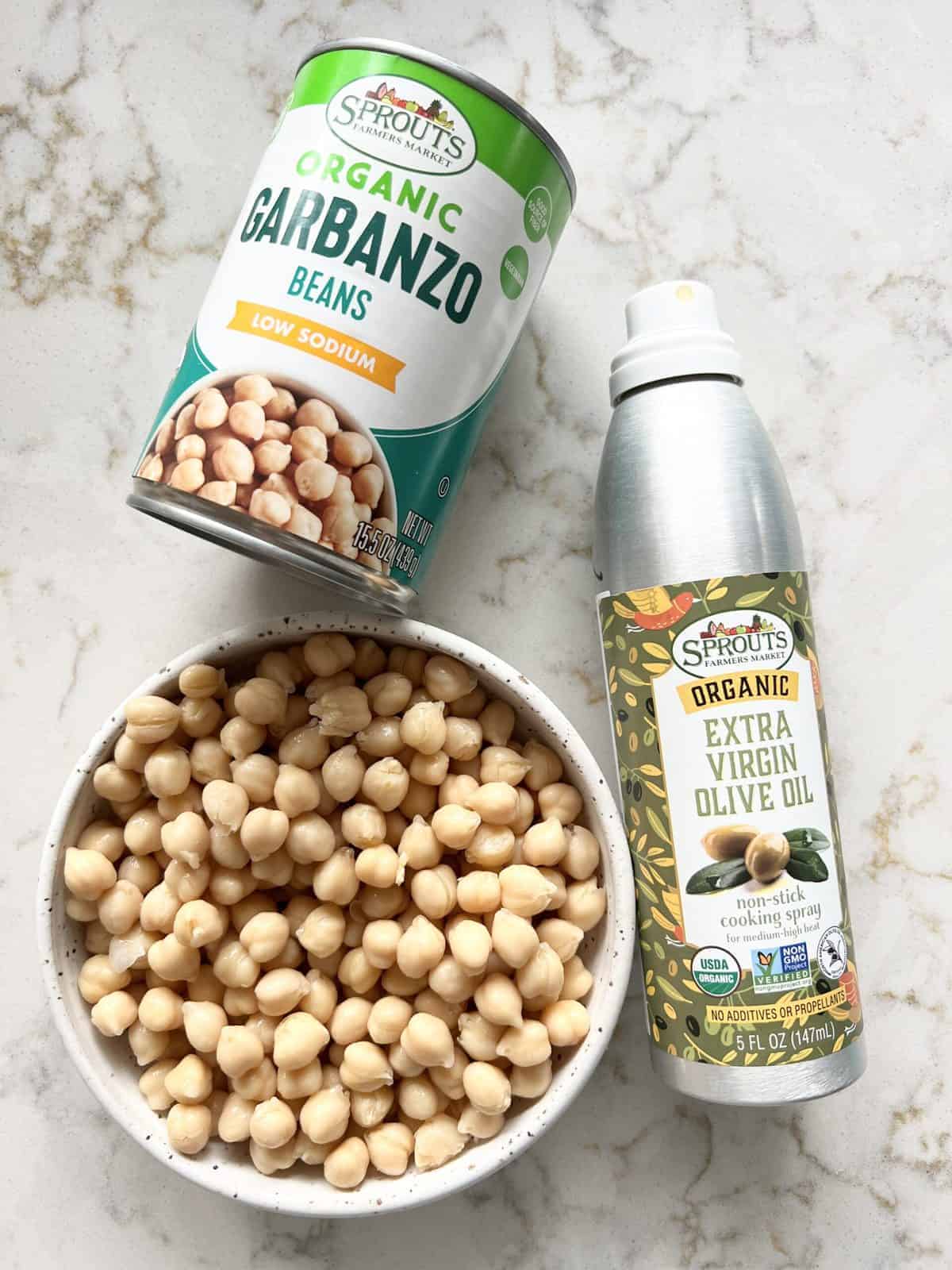 air fryer chickpea ingredients on a white marble surface
