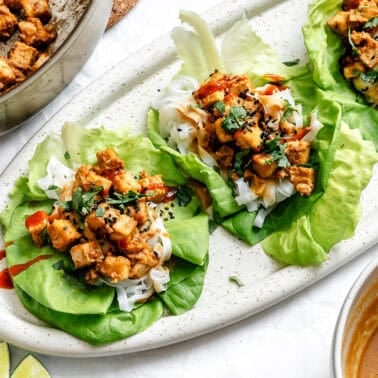 completed Tofu Lettuce Wraps with Peanut Sauce on platter