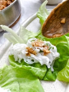 process shot showing forming lettuce wraps