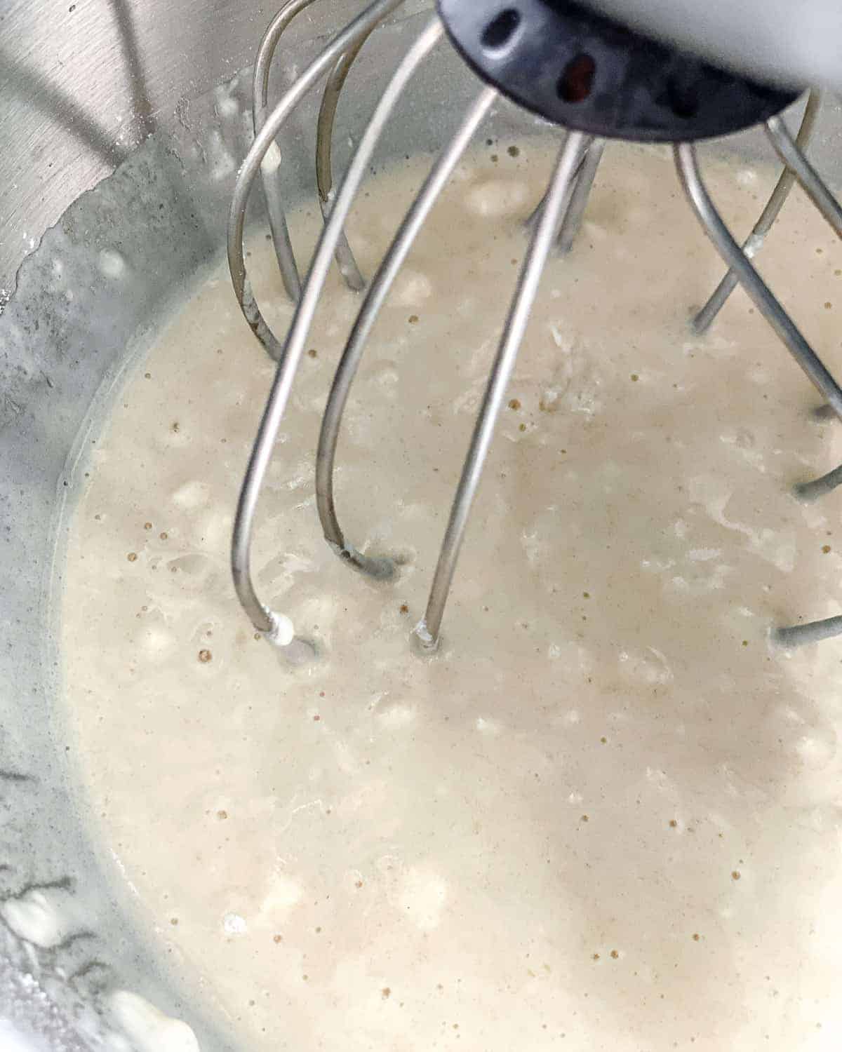 lemon cupcake batter in stainless steel bowl