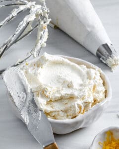 completed Lemon Buttercream Frosting in white bowl