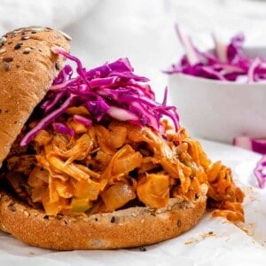 completed BBQ Jackfruit Sandwich against a white surface